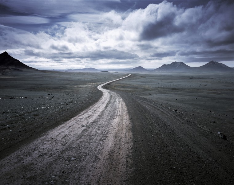 032 ja snaking road through barren landscape Jonathan Andrew