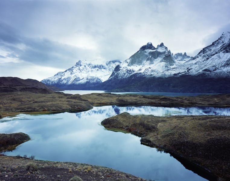 057 ja still lake with dramatic mountains Jonathan Andrew