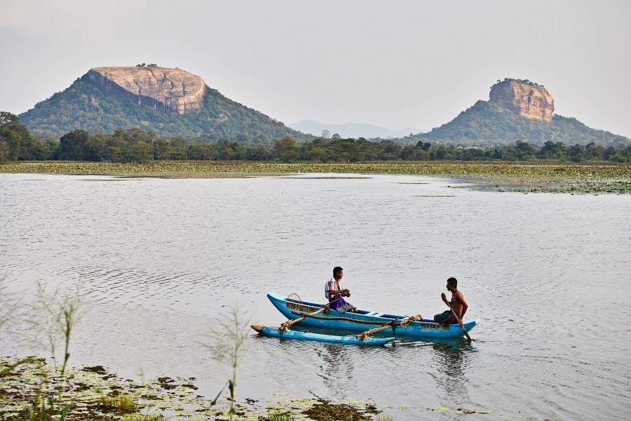 Fishermen on thalkote wewa, pidurangala and sirgiriya in background, sri lanka 810a6174 Jonathan Andrew
