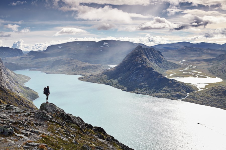 Lake gjende with hiker figure Jonathan Andrew